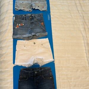 Girls denim shorts pair of four sizes 5T and 4/5.